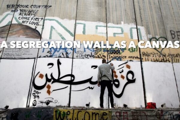 Artista de Graffiti Palestino Transforma el Muro de Segregación en Lienzo de Paz Artista_de_Graffiti_Palestino_Transforma_el_Muro_de_Segregacio_n_en_Lienzo_de_Paz video poster