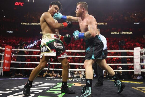 Canelo_A_lvarez_retiene_ti_tulos_con_victoria_una_nime_sobre_Mungui_a___