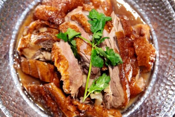 Descubre el delicioso ganso asado Wenquan de Hainan 🦆🔥 Descubre_el_delicioso_ganso_asado_Wenquan_de_Hainan___