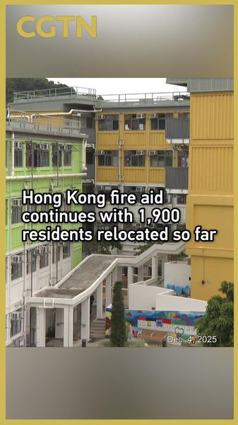 La ayuda tras incendio en Hong Kong continúa mientras 1,900 residentes son reubicados video poster