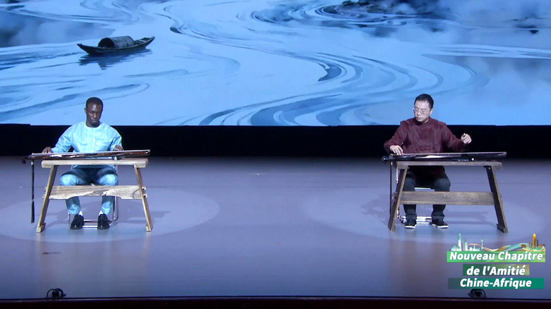 Fusión musical sin fronteras: guqin chino y ritmos de Togo video poster